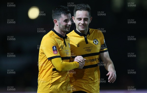 160219 - Newport County v Manchester City - FA Cup 5th Round - Padraig Amond and Matthew Dolan of Newport County at full time