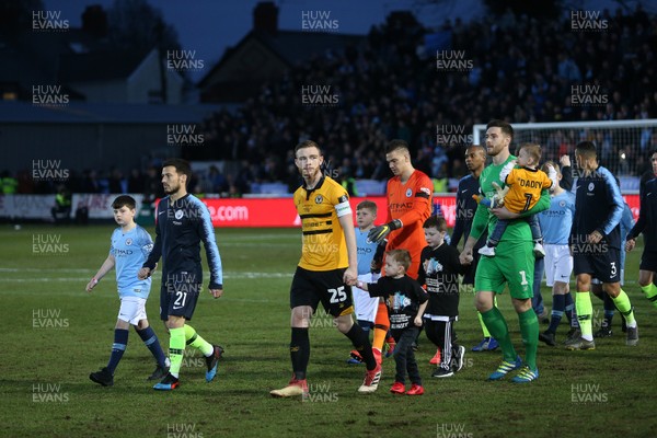 160219 - Newport County v Manchester City - FA Cup 5th Round - Teams walk out onto the pitch