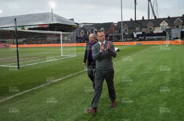 160219 - Newport County v Manchester City, FA Cup Fifth Round - Newport County manager Michael Flynn makes his way around Rodney Parade with Lenny Lawrence ahead of the match