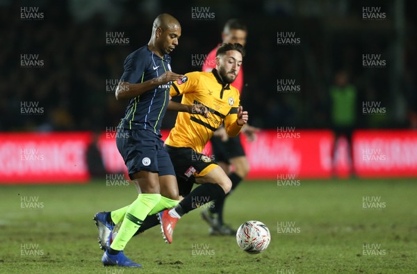 160219 - Newport County v Manchester City, FA Cup Fifth Round - Josh Sheehan of Newport County challenges Fernandinho of Manchester City