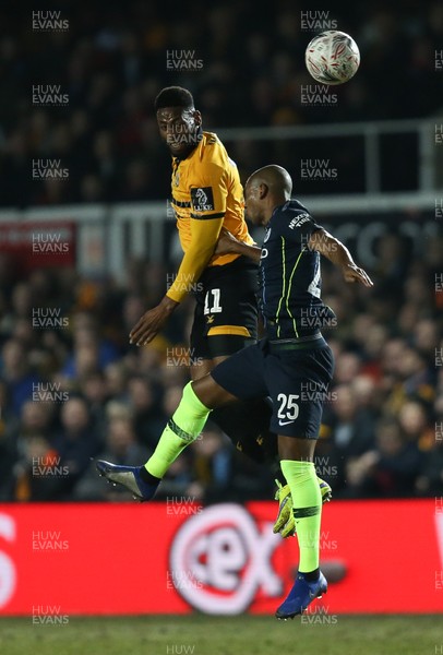 160219 - Newport County v Manchester City, FA Cup Fifth Round - Jamille Matt of Newport County and Fernandinho of Manchester City compete for the ball