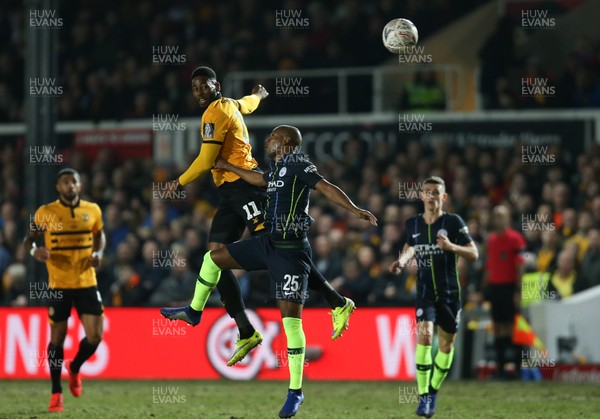 160219 - Newport County v Manchester City, FA Cup Fifth Round - Jamille Matt of Newport County and Fernandinho of Manchester City compete for the ball