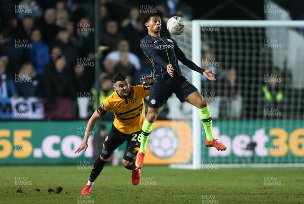 160219 - Newport County v Manchester City, FA Cup Fifth Round - Leroy Sane of Manchester City wins the ball from Regan Poole of Newport County