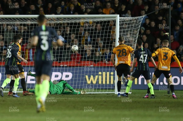 160219 - Newport County v Manchester City, FA Cup Fifth Round - Phil Foden of Manchester City shoots to score the second goal