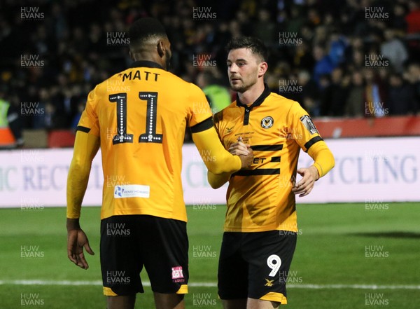 160219 - Newport County v Manchester City, FA Cup Fifth Round - Padraig Amond of Newport County with Jamille Matt of Newport County t the end of the match