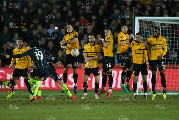 160219 - Newport County v Manchester City, FA Cup Fifth Round - Newport County players defend a free kick from Leroy Sane of Manchester City