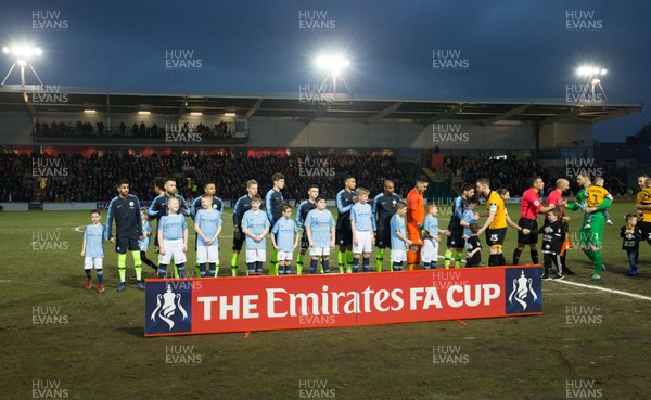 160219 - Newport County v Manchester City, FA Cup Fifth Round - The teams greet each other prior to kick off