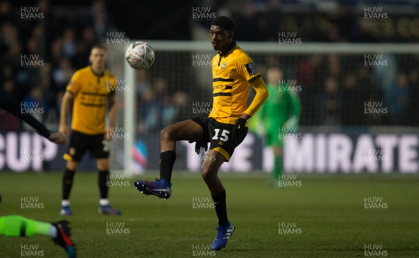 160219 - Newport County v Manchester City, FA Cup Fifth Round - Tyreeq Bakinson of Newport County plays the ball
