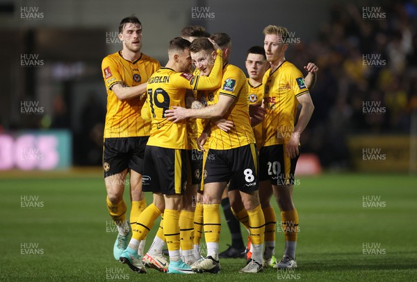 280124 - Newport County v Manchester United - FA Cup, Fourth Round - Bryn Morris of Newport County celebrates scoring a goal with team mates
