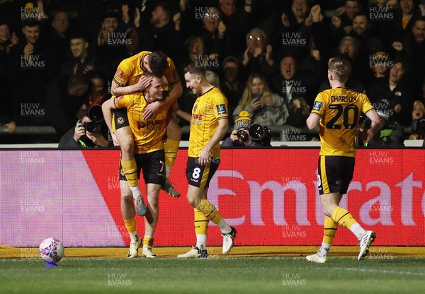 280124 - Newport County v Manchester United - FA Cup, Fourth Round - Will Evans of Newport County celebrates scoring a goal in the second half with team mates