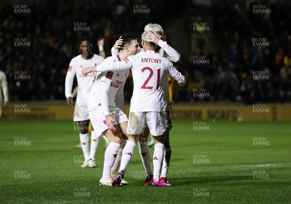 280124 - Newport County v Manchester United - FA Cup, Fourth Round - Antony of Manchester United celebrates scoring a goal with team mates