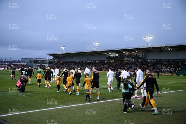 280124 - Newport County v Manchester United - FA Cup, Fourth Round - The teams walk out at the start of the game