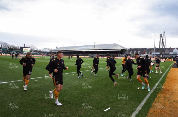 280124 - Newport County v Manchester United, FA Cup Fourth Round - Newport County players warm up ahead of the match