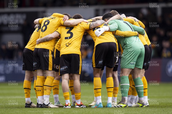 020324 - Newport County v Mansfield Town - Sky Bet League 2 - Newport County huddle ahead of kick off