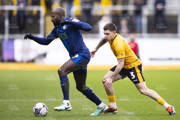 020324 - Newport County v Mansfield Town - Sky Bet League 2 - Hiram Boateng of Mansfield Town in action against Adam Lewis of Newport County