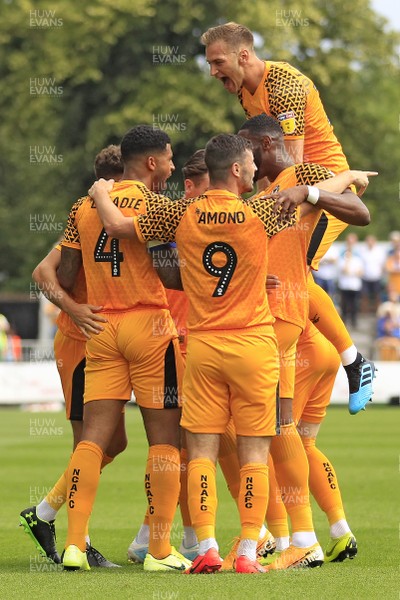 030819 - Newport County v Mansfield Town, Sky Bet League 2 - Joss Labadie of Newport County (left) celebrates scoring his side's first goal with team-mates