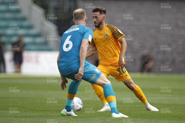 030819 - Newport County v Mansfield Town, Sky Bet League 2 - Josh Sheehan of Newport County (right) in action with Neal Bishop of Mansfield Town