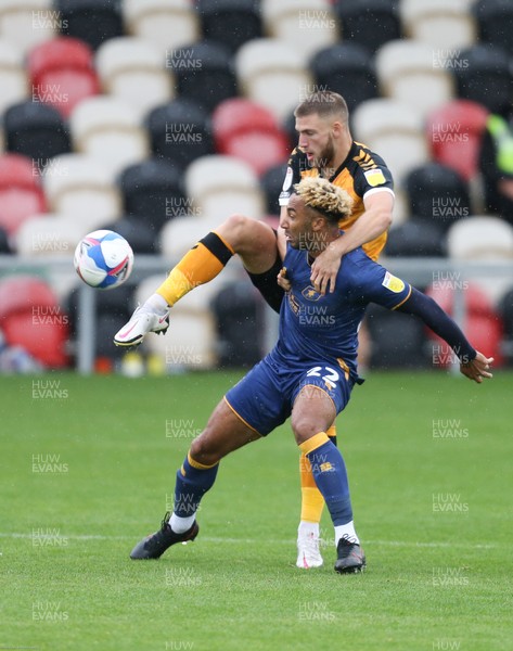 031020 - Newport County v Mansfield Town, Sky Bet League 2 - Brandon Cooper of Newport County puts Nicky Maynard of Mansfield Town under pressure
