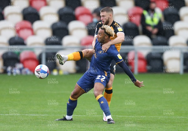 031020 - Newport County v Mansfield Town, Sky Bet League 2 - Brandon Cooper of Newport County puts Nicky Maynard of Mansfield Town under pressure