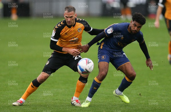 031020 - Newport County v Mansfield Town, Sky Bet League 2 - Mickey Demetriou of Newport County and Jamie Reid of Mansfield Town compete for the ball