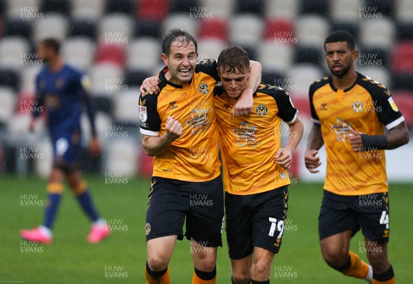 031020 - Newport County v Mansfield Town, Sky Bet League 2 - Matty Dolan of Newport County, left, celebrates with Scott Twine and Joss Labadie of Newport County, right, after scoring from the penalty spot