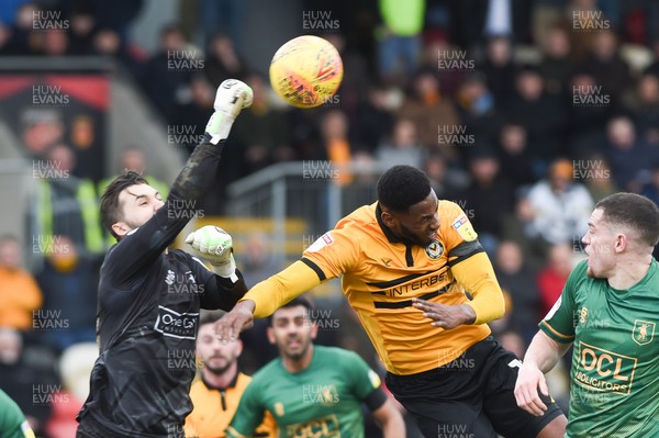 090219 - Newport County v Mansfield Town - Sky Bet League 2 - Jordan Smith of Mansfield Town pushes the ball under pressure from  Jamille Matt of Newport County