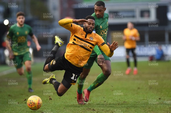090219 - Newport County v Mansfield Town - Sky Bet League 2 -  Jamille Matt of Newport County is tackled by Krystian Pearce of Mansfield Town
