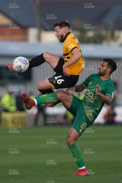 090519 - Newport County v Mansfield Town - Sky Bet League 2 - Play Off 1st Leg - Josh Sheehan of Newport County beats Jacob Mellis of Mansfield Town to the ball 
