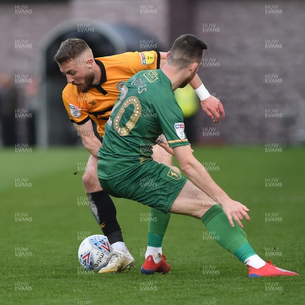 090519 - Newport County v Mansfield Town - Sky Bet League 2 - Play Off 1st Leg -  Dan Butler of Newport County takes on Gethin Jones of Mansfield Town 