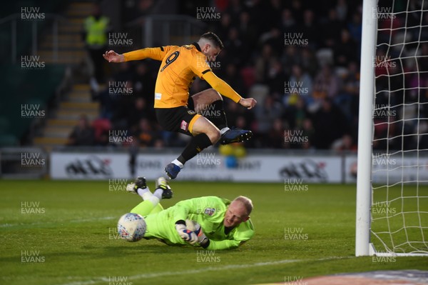 090519 - Newport County v Mansfield Town - Sky Bet League 2 - Play Off 1st Leg - Conrad Logan of Mansfield Town saves at the feet of  Padraig Amond of Newport County 