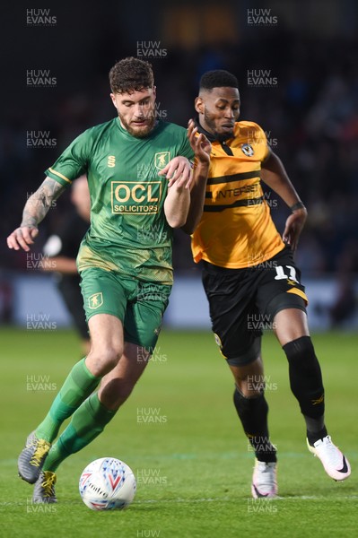 090519 - Newport County v Mansfield Town - Sky Bet League 2 - Play Off 1st Leg - Ryan Sweeney of Mansfield Town and  Jamille Matt of Newport County compete for the ball 