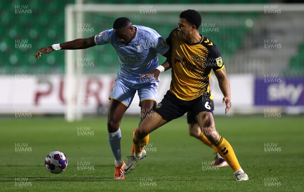 180423 - Newport County v Mansfield Town - SkyBet League Two - Priestley Farquharson of Newport County is challenged by Lucas Akins of Mansfield 