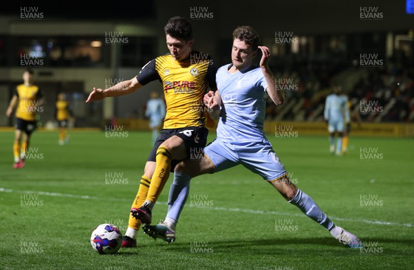 180423 - Newport County v Mansfield Town - SkyBet League Two - Calum Kavanagh of Newport County is challenged by Riley Harbottle of Mansfield 
