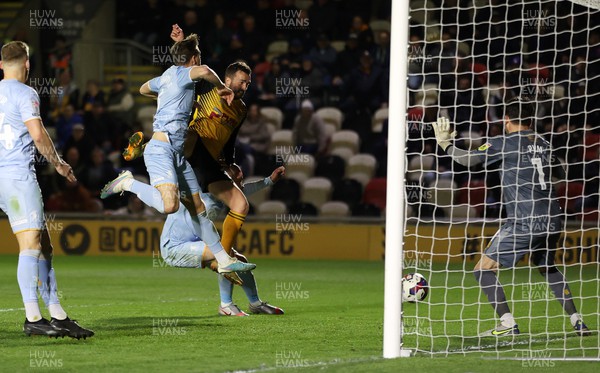 180423 - Newport County v Mansfield Town - SkyBet League Two - Aaron Wildig of Newport County headers the ball to score a goal