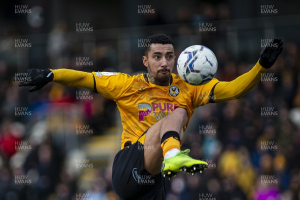 190222 - Newport County v Mansfield Town - Sky Bet League 2 - Courtney Baker-Richardson of Newport County acrobatically chips the ball over the goal
