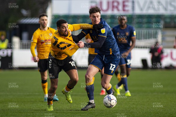 190222 - Newport County v Mansfield Town - Sky Bet League 2 - Courtney Baker-Richardson of Newport County (L) in action against Oliver Hawkins of Mansfield Town (R)