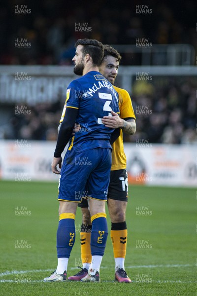 190222 - Newport County v Mansfield Town - Sky Bet League 2 - Dom Telford of Newport County (R) with Stephen McLaughlin of Mansfield Town (L) at full time