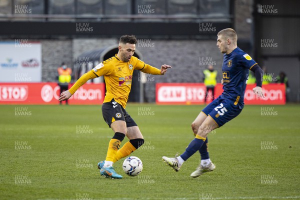 190222 - Newport County v Mansfield Town - Sky Bet League 2 - Courtney Baker-Richardson of Newport County (L) in action against Ryan Stirk of Mansfield Town (R)