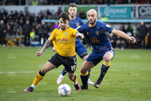 190222 - Newport County v Mansfield Town - Sky Bet League 2 - Dom Telford of Newport County (L) in action against Farrend Rawson of Mansfield Town (R)