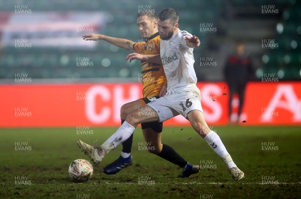050219 - Newport County v Middlesbrough - FA Cup Fourth Round Replay - Mickey Demetriou of Newport County is tackled by Jonathan Howson of Middlesbrough