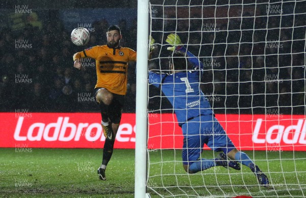 050219 - Newport County v Middlesbrough, FA Cup Round 4 Replay - Padraig Amond of Newport County sees his shot at goal blocked by Middlesbrough goalkeeper Dimitrios Konstantopoulos