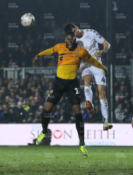 050219 - Newport County v Middlesbrough, FA Cup Round 4 Replay - Jamille Matt of Newport County and Daniel Ayala of Middlesbrough compete for the ball