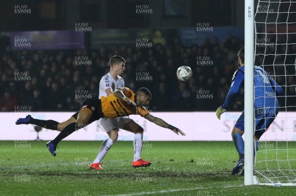 050219 - Newport County v Middlesbrough, FA Cup Round 4 Replay - Joss Labadie of Newport County dives in as he tries to head at goal