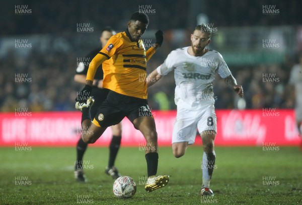 050219 - Newport County v Middlesbrough, FA Cup Round 4 Replay - Tyreeq Bakinson of Newport County fires a shot at goal as Adam Clayton of Middlesbrough closes in