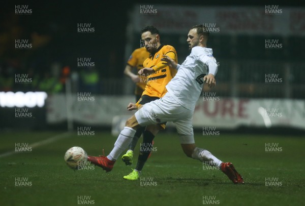 050219 - Newport County v Middlesbrough, FA Cup Round 4 Replay - Robbie Willmott of Newport County plays the ball past Lewis Wing of Middlesbrough