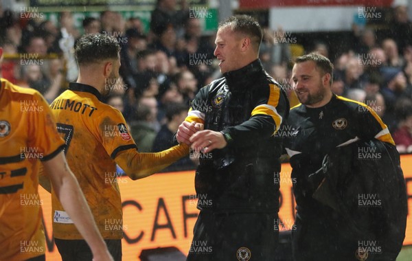 050219 - Newport County v Middlesbrough, FA Cup Round 4 Replay - Newport County manager Michael Flynn celebrates with Robbie Willmott of Newport County at the end of the match