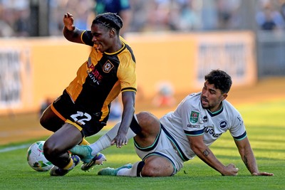120825 - Newport County v Millwall - Carabao Cup Round 1 - Habeeb Ogunneye of Newport County is challenged by Massimo Luongo of Millwall