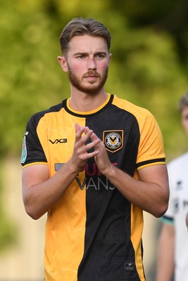 120825 - Newport County v Millwall - Carabao Cup Round 1 - Matthew Baker of Newport County walks out at the start of the match