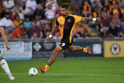 120825 - Newport County v Millwall - Carabao Cup Round 1 - Courtney Baker-Richardson of Newport County has a shot at goal