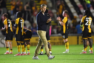 120825 - Newport County v Millwall - Carabao Cup Round 1 - Newport County Manager, David Hughes applauding the fans support at full time